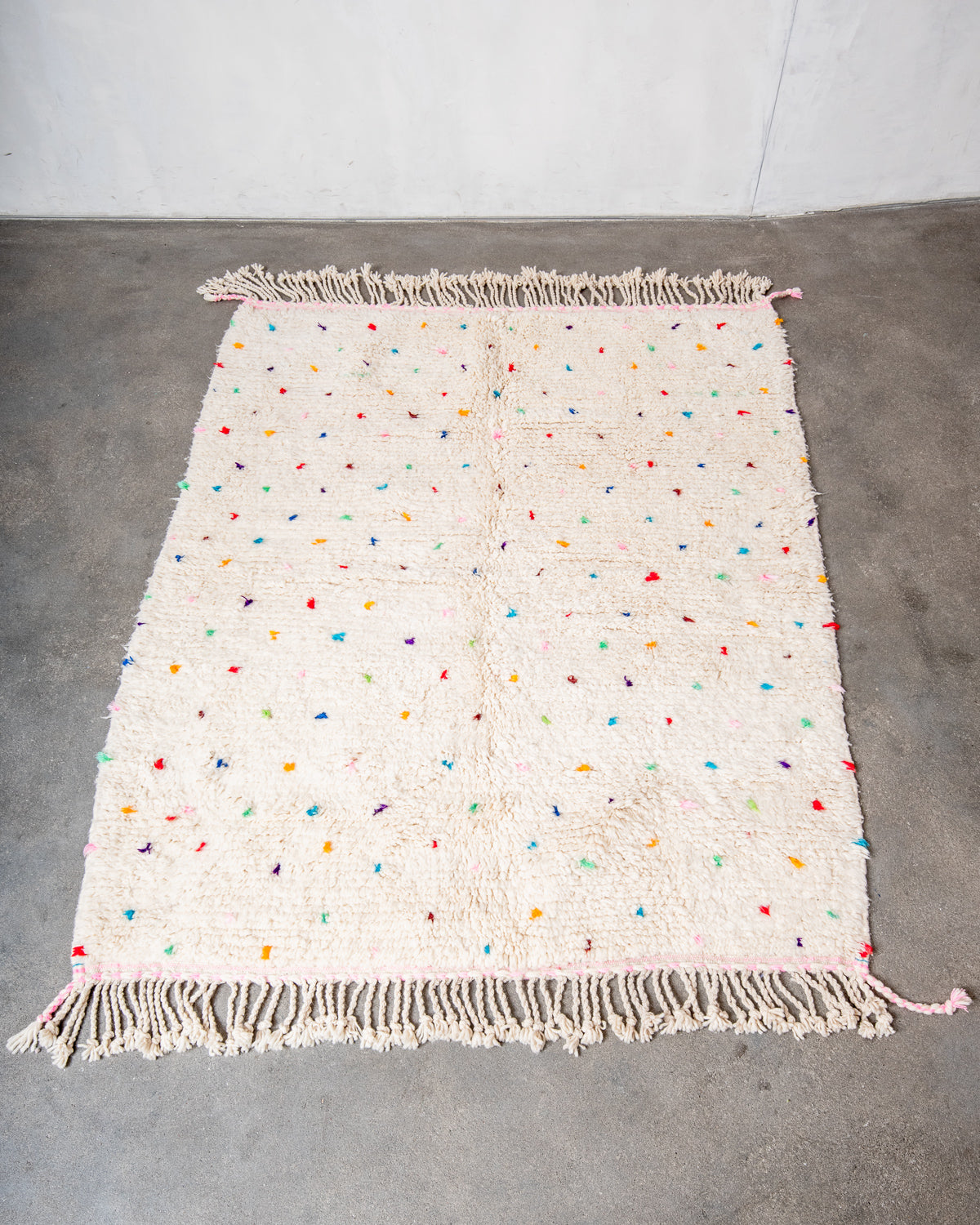 Modern, designer, handcrafted Berber rug from Morocco. Beniourain carpet with beautiful colours and patterns and fluffy wool texture.